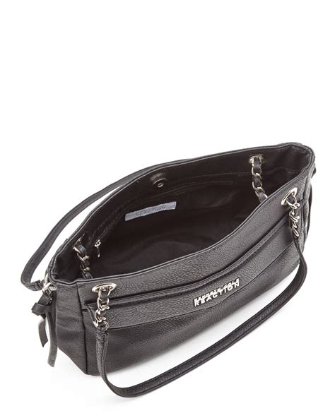 Kenneth cole reaction handbags - Shop Women's Kenneth Cole Reaction Black Size Medium Shoulder Bags at a discounted price at Poshmark. Description: Beautiful medium sized black colored leather purse / handbag with a polyester lining and magnetic snap closure. The purse features silver hardware small internal zipped compartments for storage and organization. The bag …